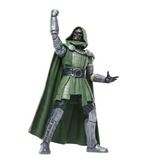 A Marvel Doctor Strange action figure posed with one arm raised, wearing a green hooded robe, dark tunic, and metallic silver armor against a plain white background.