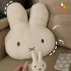 large bunny plush on a sofa