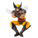 A Wolverine action figure posed in a crouching stance with claws extended, set against a clean white studio background.