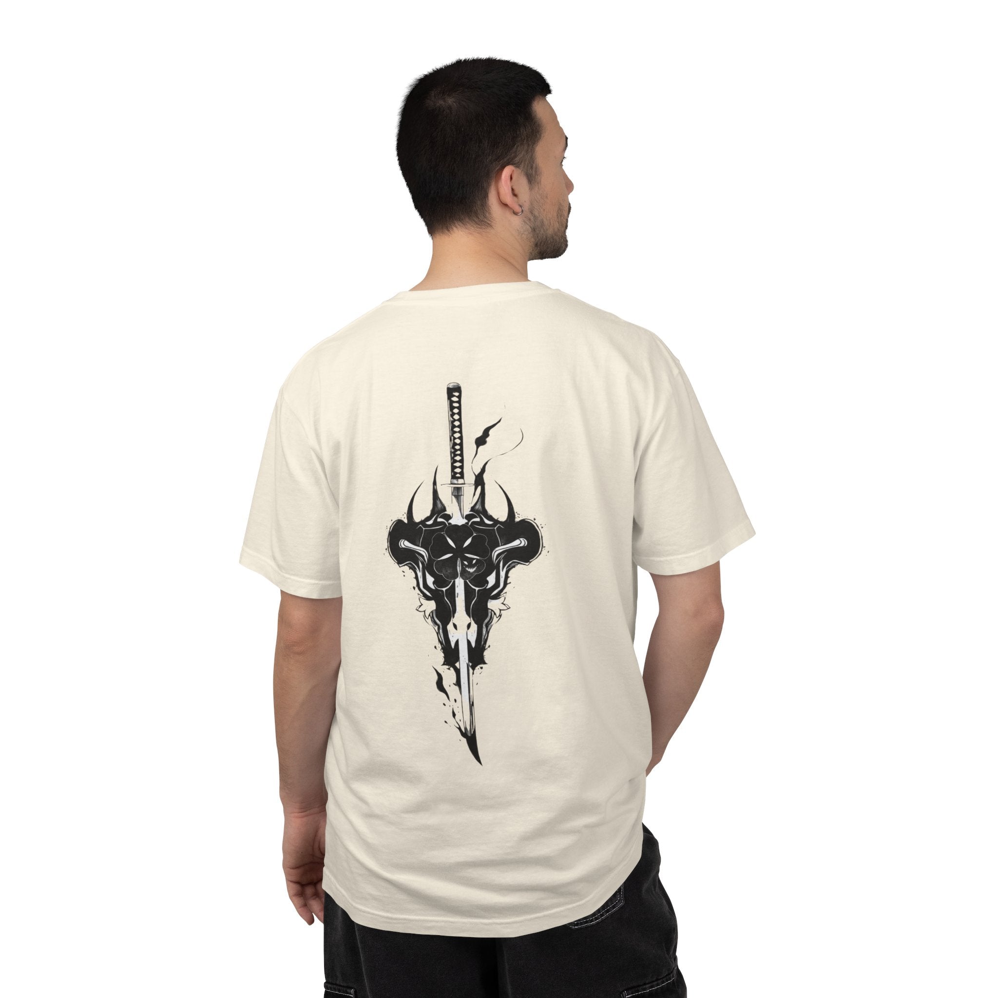 Man wearing a white t-shirt with a skull graphic and text on the back, standing against a white background.