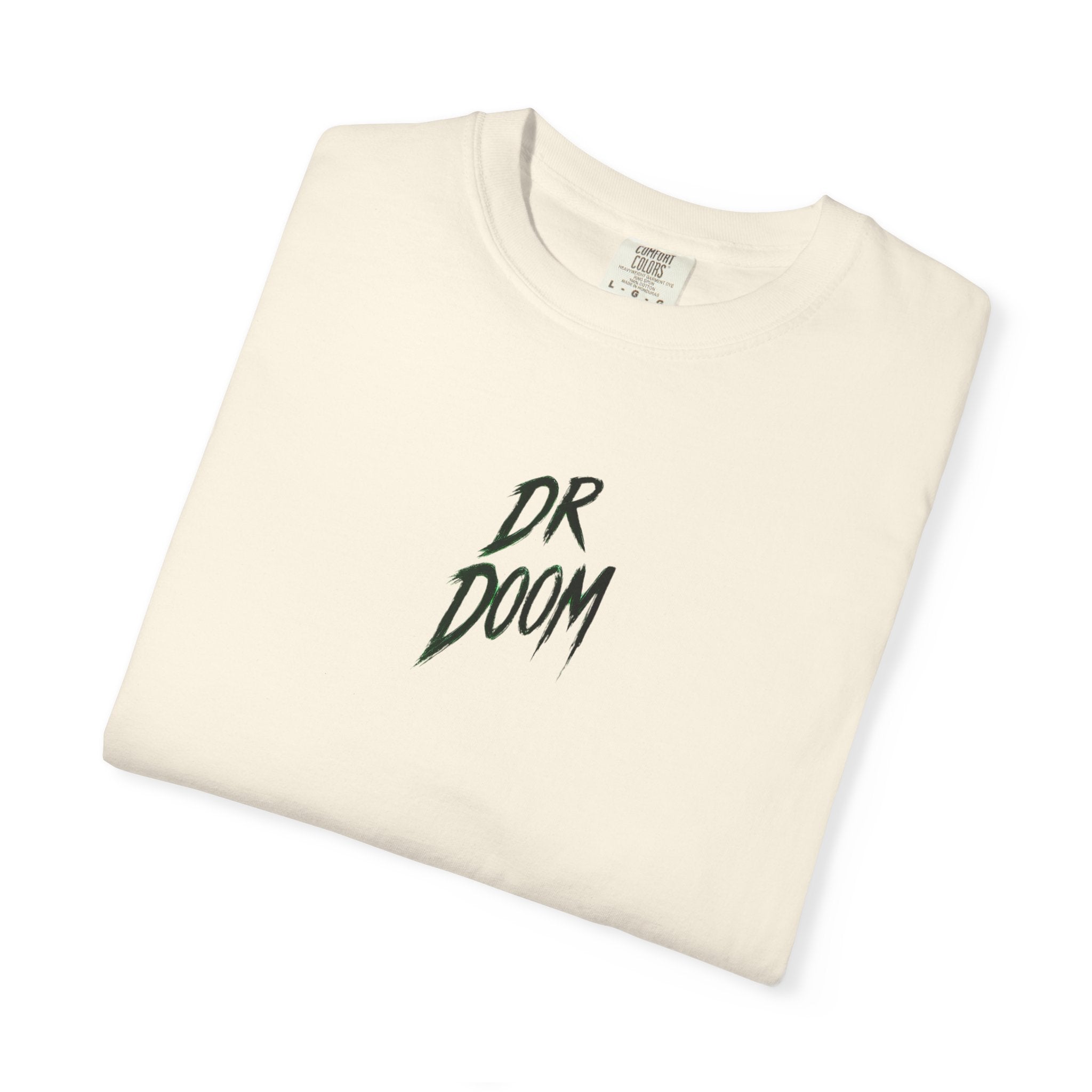 A folded off-white crewneck t-shirt with a black 'DR DOOM' logo printed on the chest, displayed on a clean white background.