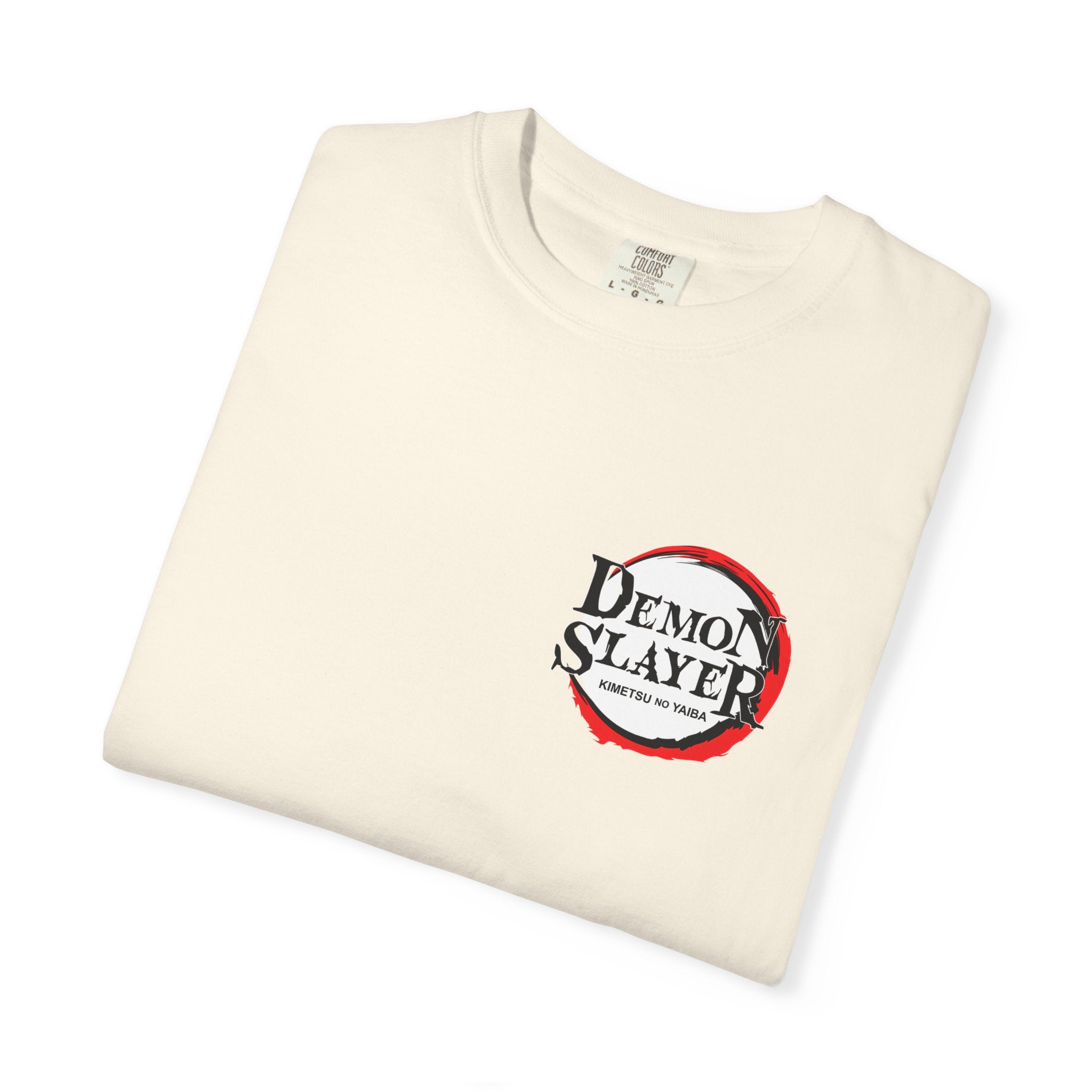 A folded off-white crewneck t-shirt featuring the 'Demon Slayer' anime logo in red, black, and white on the left chest, displayed on a clean white background.
