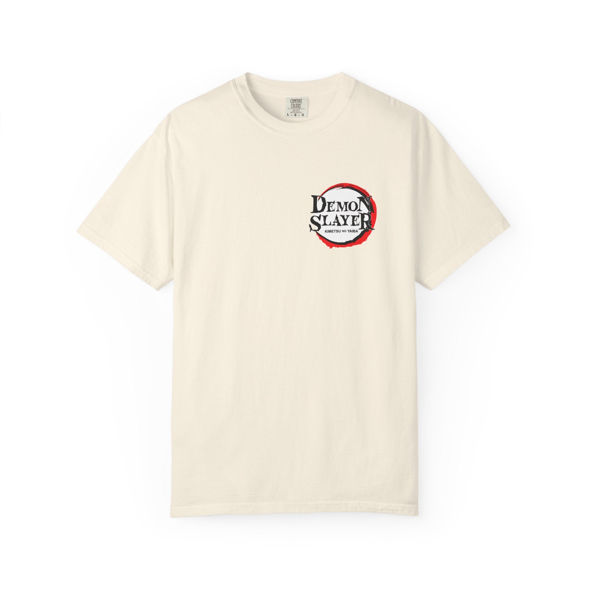 An off-white short-sleeve crewneck t-shirt featuring a circular 'Demon Slayer' graphic on the left chest, displayed against a solid white background.