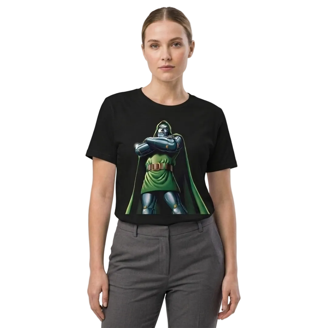 A woman modeling a black short-sleeve crewneck t-shirt with a graphic print of Doctor Doom from Marvel Comics, paired with gray trousers, against a plain white background.