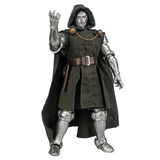 A detailed action figure of Doctor Doom from Marvel, featuring silver metallic armor, a dark green hooded cloak, and a brown belt, posed against a light gray studio background.