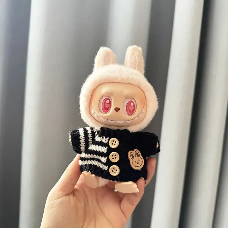 Mini Labubu plush toy in black bunny-themed sweater