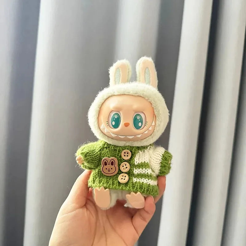 Mini Labubu plush toy in green bunny-themed sweater