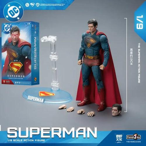 Superman action figure with packaging and accessories on a gray background