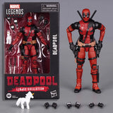 Deadpool action figure from Marvel Legends series next to its packaging on a gray background