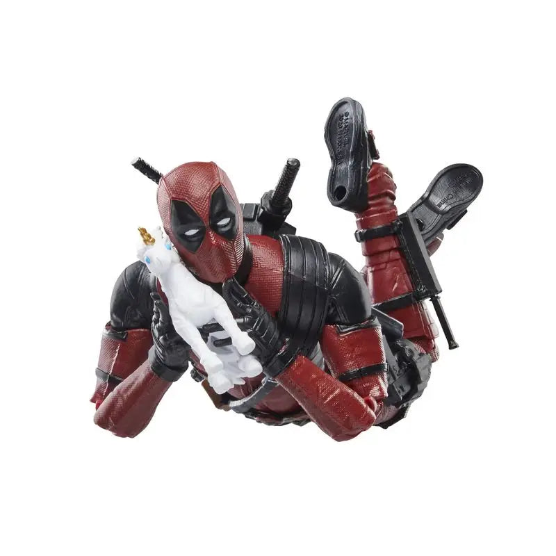 Deadpool action figure holding a weapon on a white background