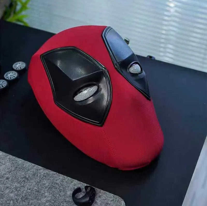 Red car seat cover with black interior on a black surface
