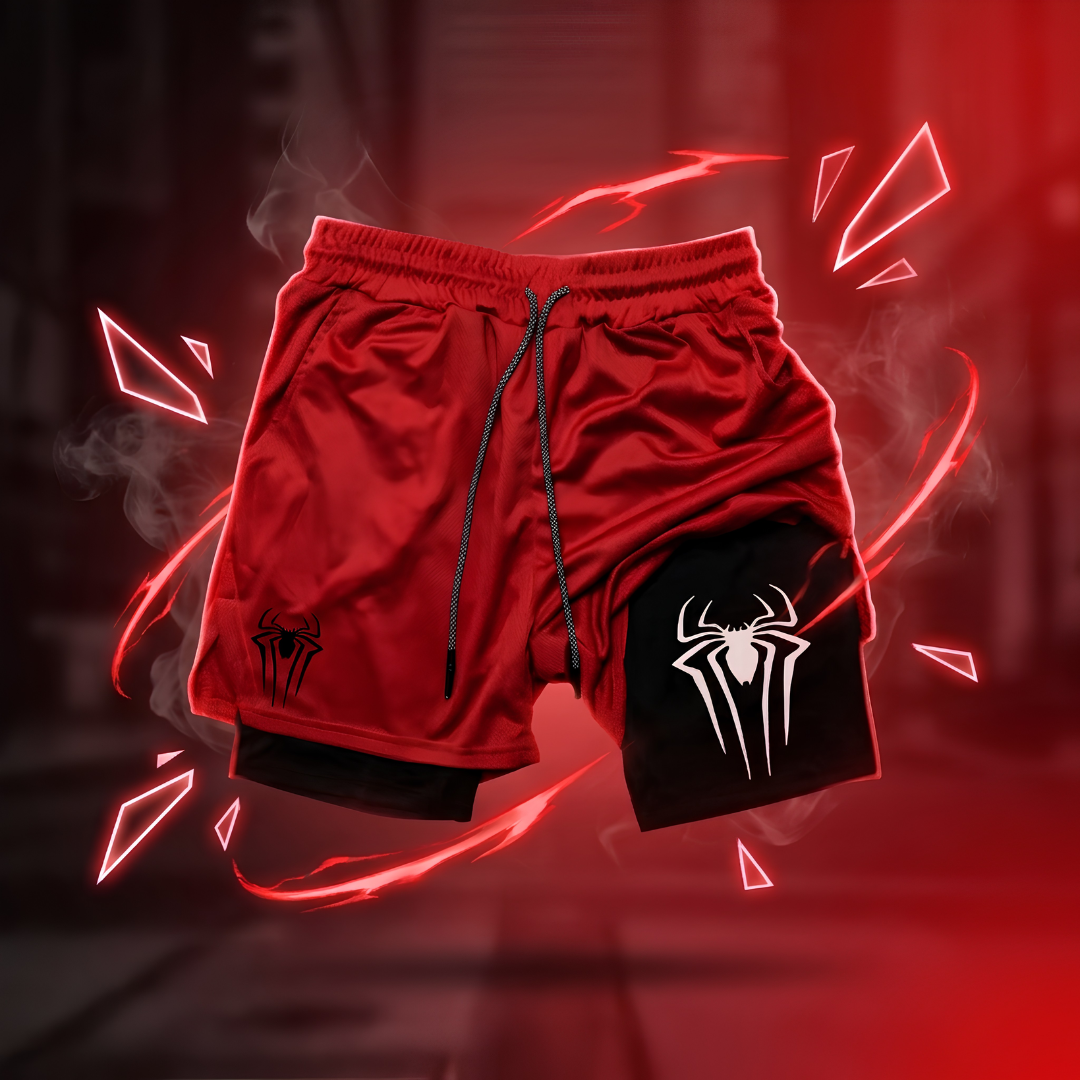 Red and black Spider-Man themed athletic shorts with a black inner layer, featuring a black spider logo on the left leg and a white spider logo on the right leg, set against a dark red background with digital smoke and red energy effects.