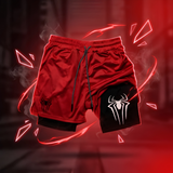 Red and black Spider-Man themed athletic shorts with a black inner layer, featuring a black spider logo on the left leg and a white spider logo on the right leg, set against a dark red background with digital smoke and red energy effects.