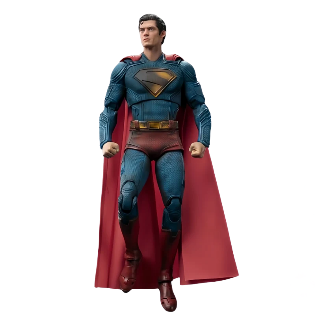 Superman action figure or collectible statue in a walking pose, featuring his classic blue textured suit, red cape, and gold chest emblem, isolated on a white background.