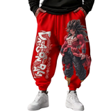 Red Dragon Ball Z harem pants with a large graphic print of Super Saiyan Gohan and vertical Dragon Ball Z text, shown on a model wearing a black hoodie and white sneakers.