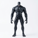 A black action figure of Venom with white lightning-like markings on its chest and arms, standing against a plain white background.